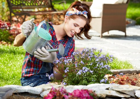 Team member preparing mower for lawn mowing service